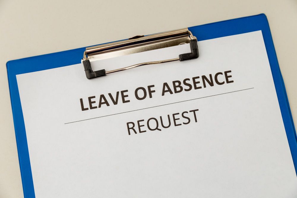 Personal leave of absence statement form at the desk